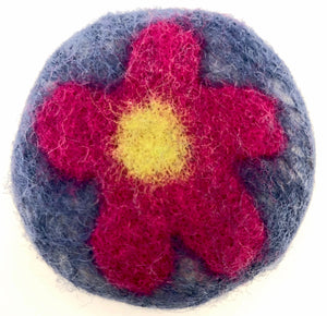 Guest sized felted soap decorated with fuchsia flower and navy background