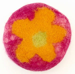 Guest sized felted soap decorated with orange flower and fuchsia background